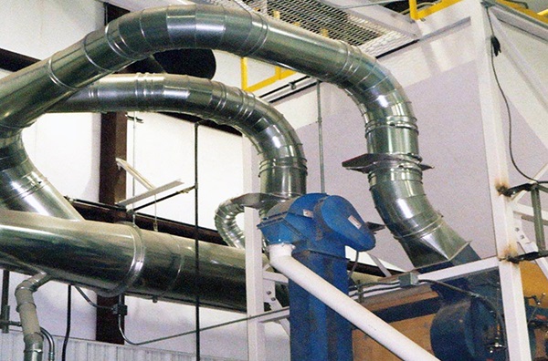 Agriculture dust ductwork installed at a seed company to control product dust.