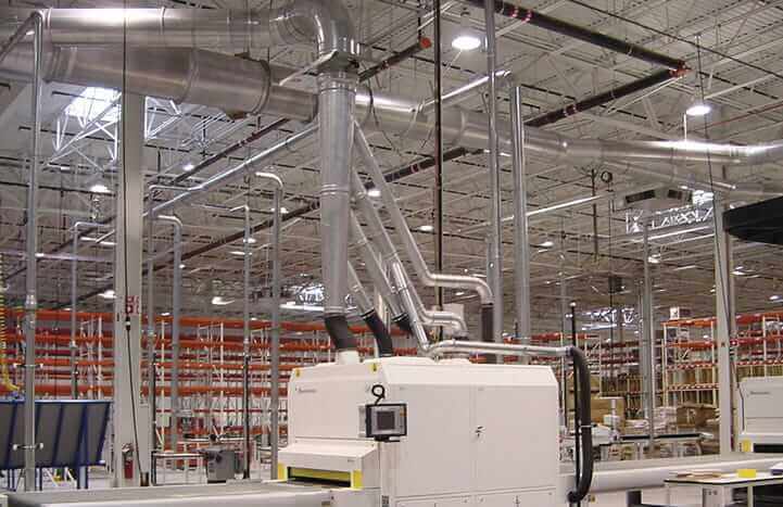 Nordfab Ducting installed on machinery in an industrial facility.