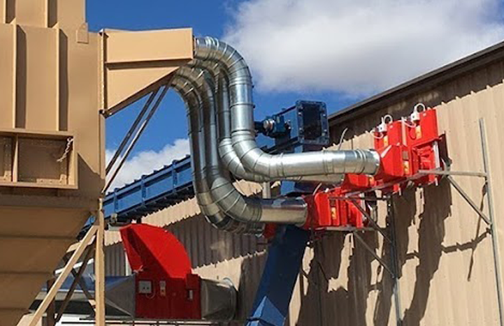 Nordfab Ducting installed outside of an industrial facility to help exhaust air contaminants.