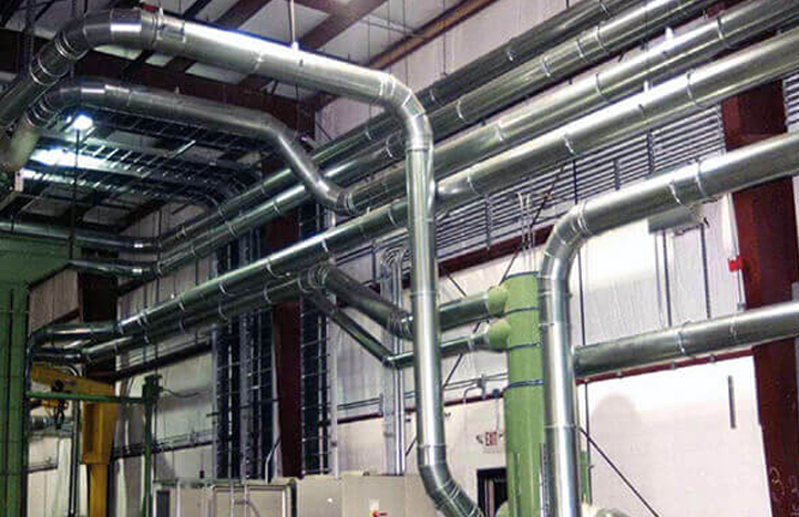 Nordfab ductwork system installed in an industrial facility to help draw away dust and other airborne contaminants.