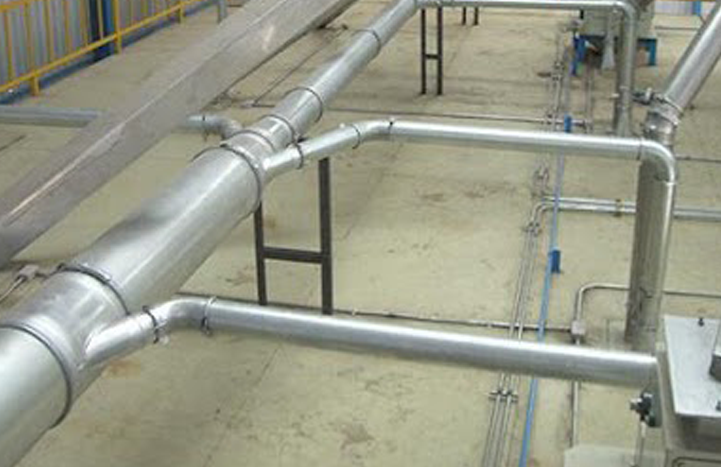 Nordfab Ducting shown installed in an industrial plant to remove fumes, dust, and other contaminants.